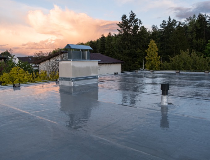 A flat roof with a bitumen membrane, installed by the commercial roofing experts at Denny Zimmerman Roofing